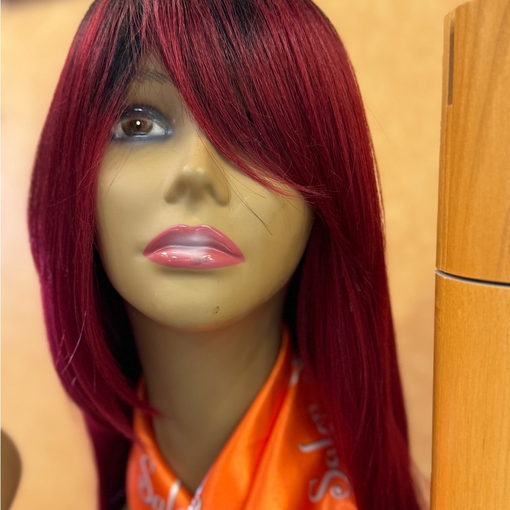 Sleek Red Wig with Side-Swept Bangs